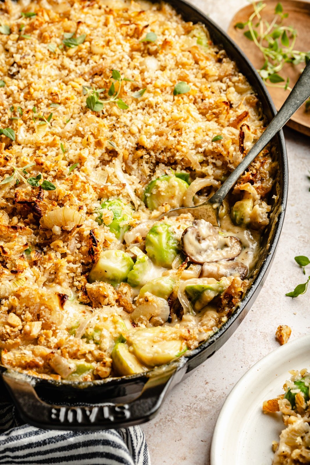 brussels sprouts au gratin in a skillet