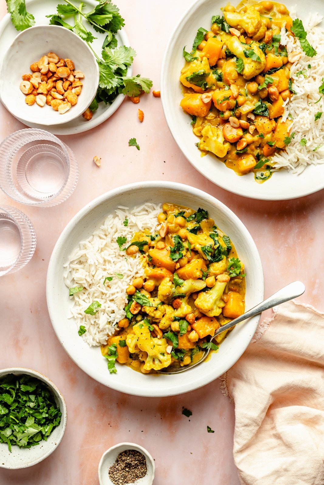 butternut squash curry in two bowls with rice