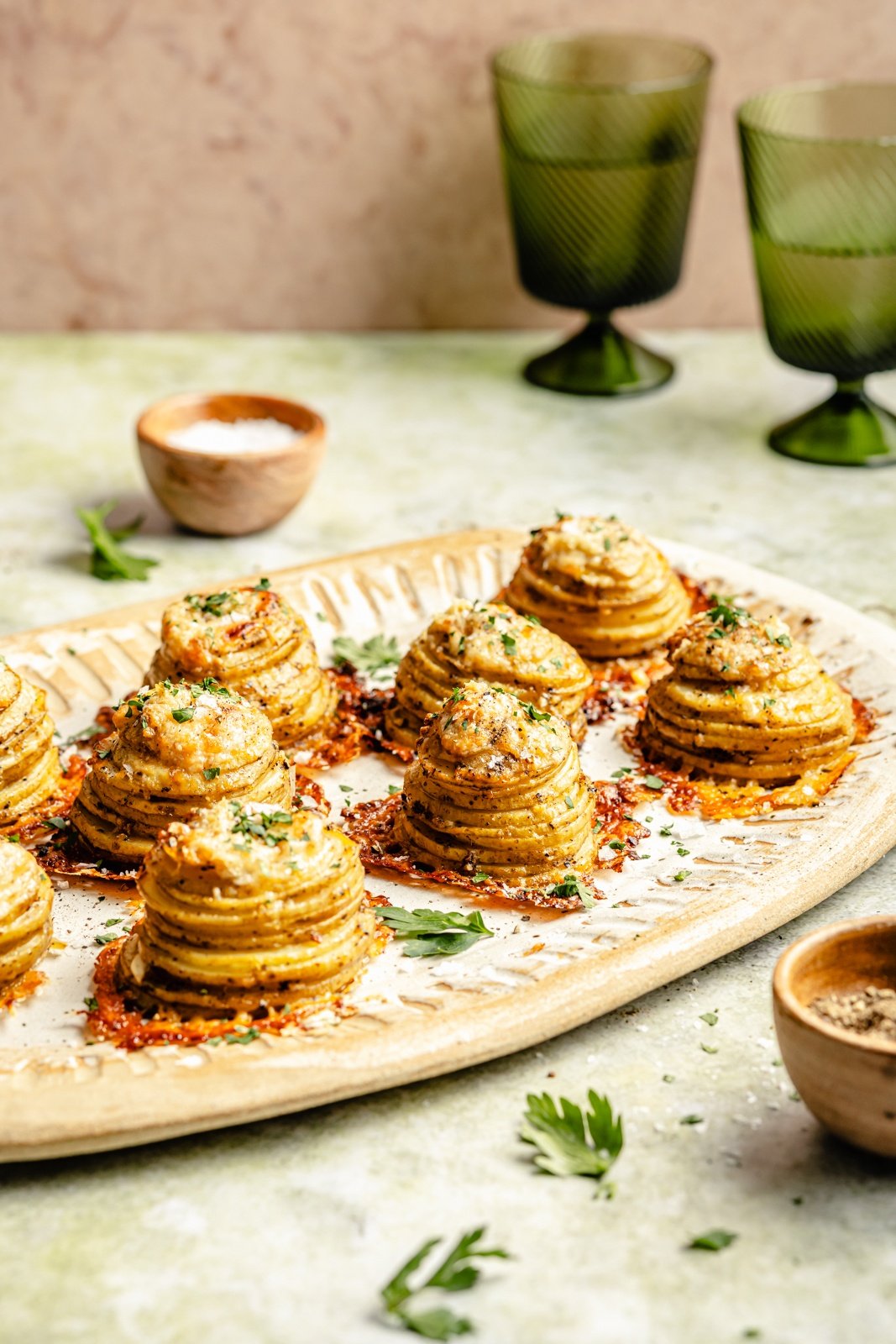 cheesy roasted potato stacks on a serving platter