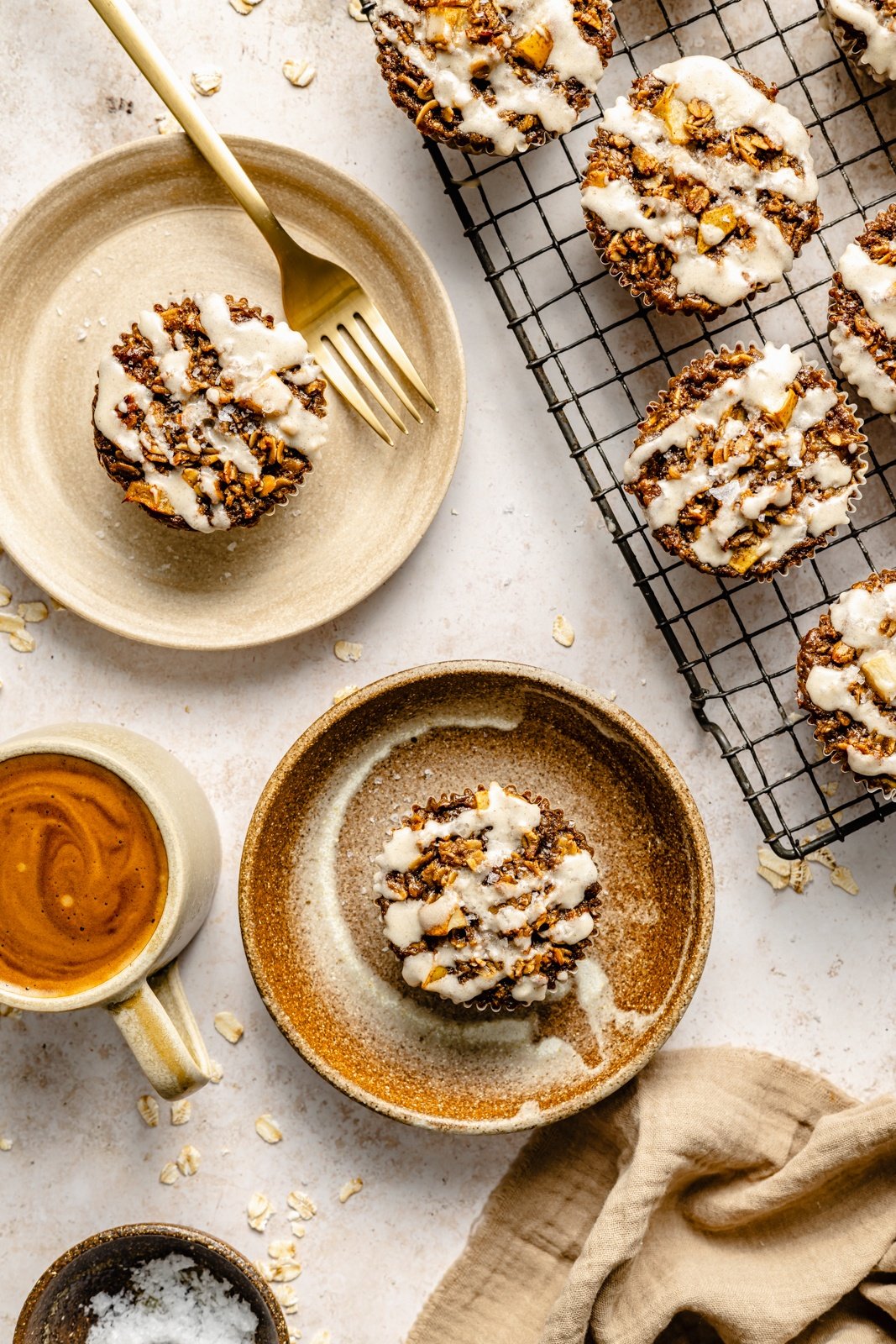 gingerbread oatmeal cups on plates and on a wire rack