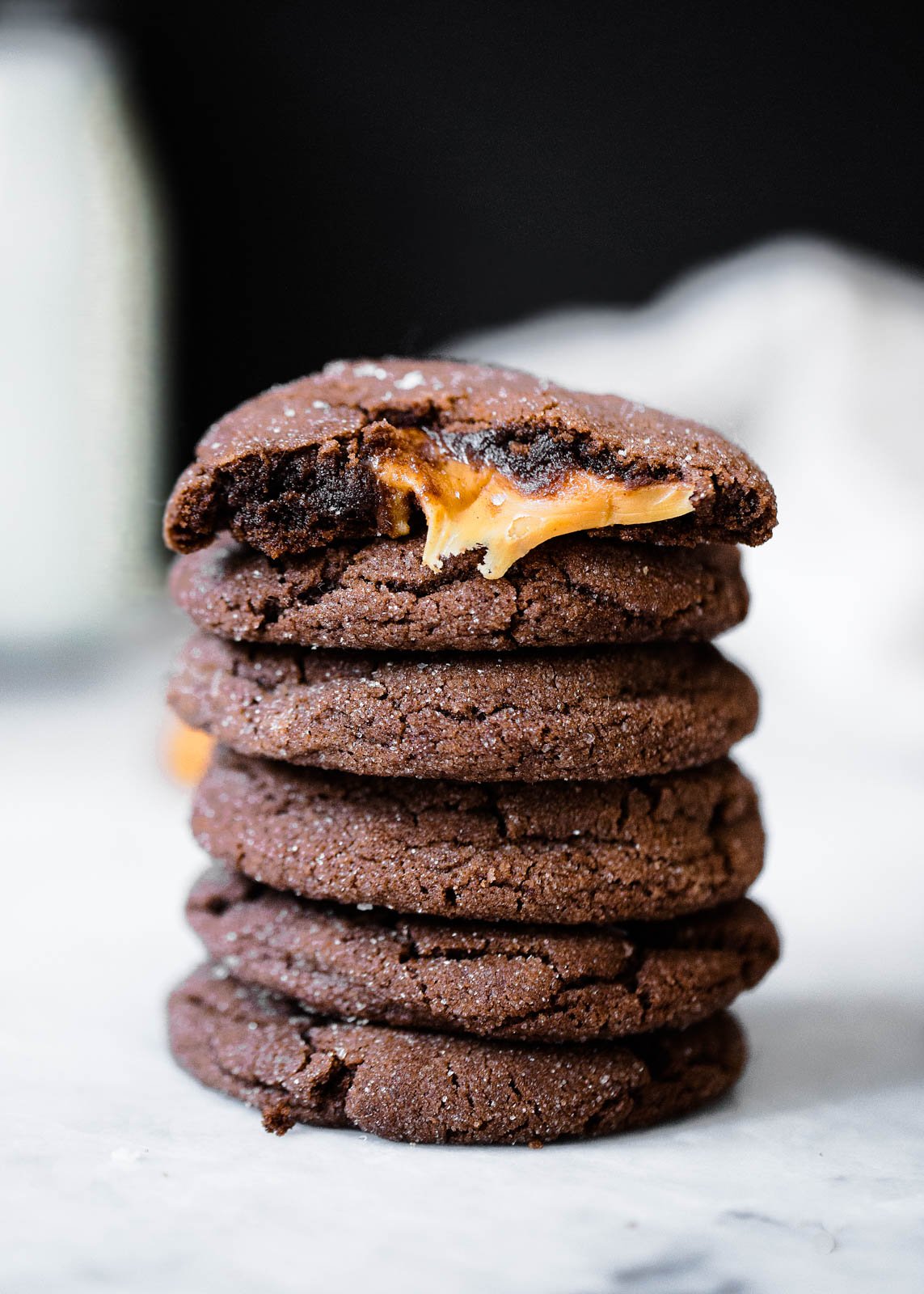 chocolate snickerdoodles stuffed with caramel in a stack