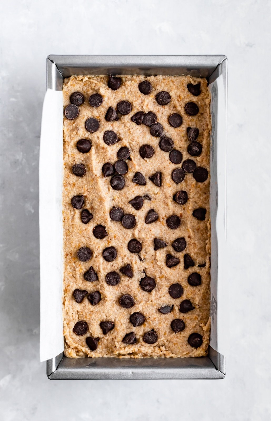almond flour banana bread batter in a loaf pan