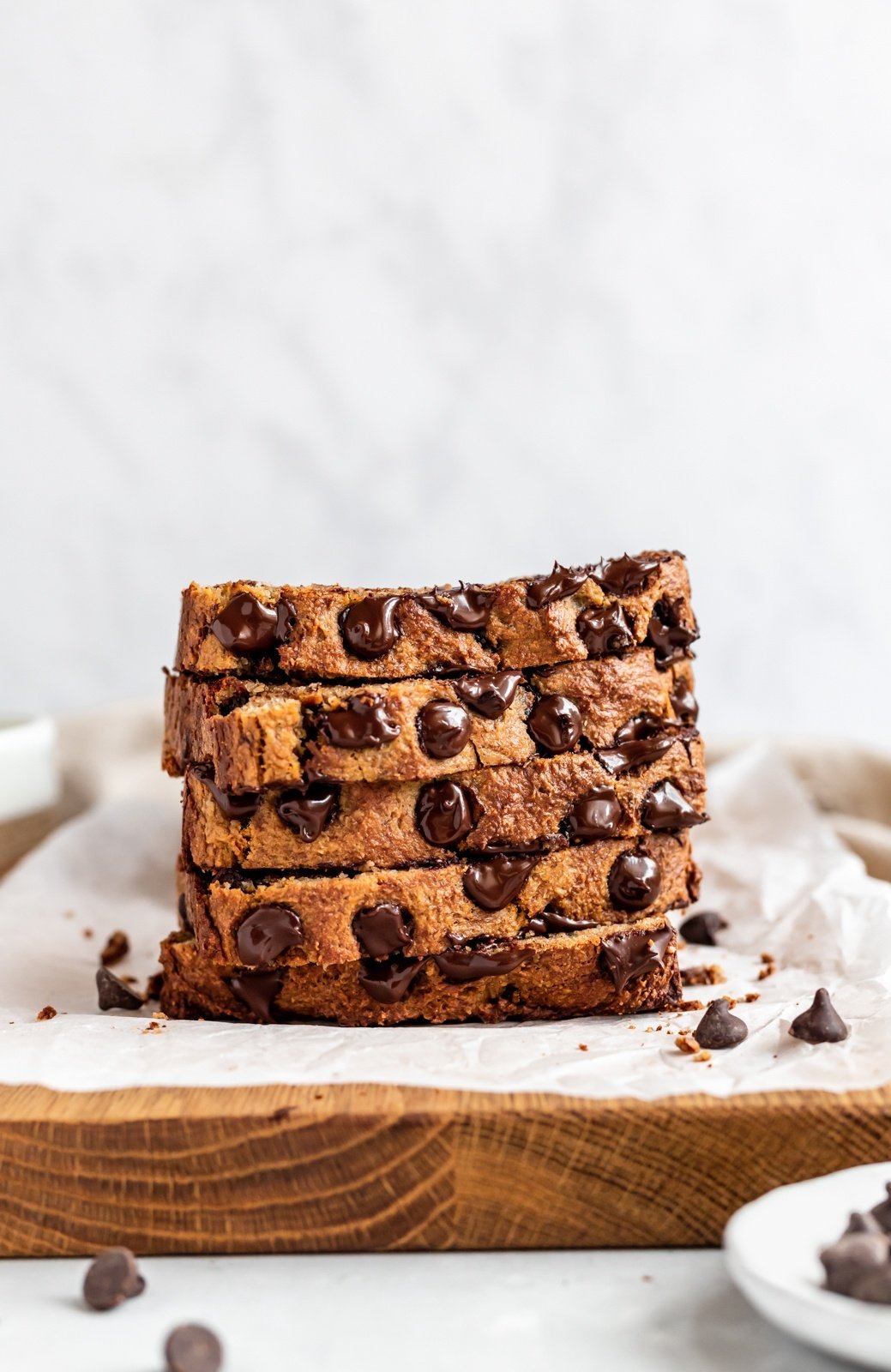 almond flour banana bread slices stacked on top of eachother