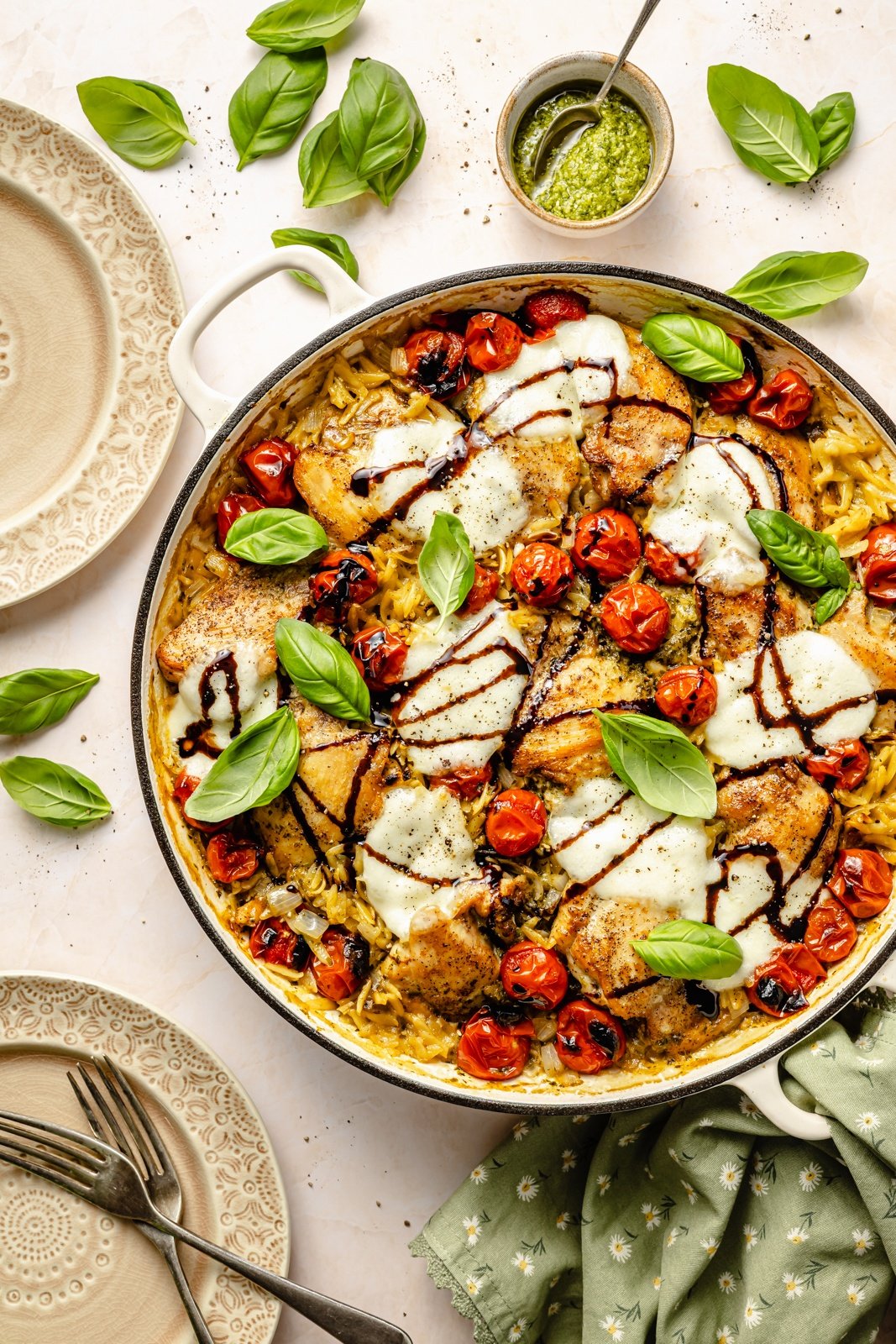 one pan chicken caprese orzo bake in a pan