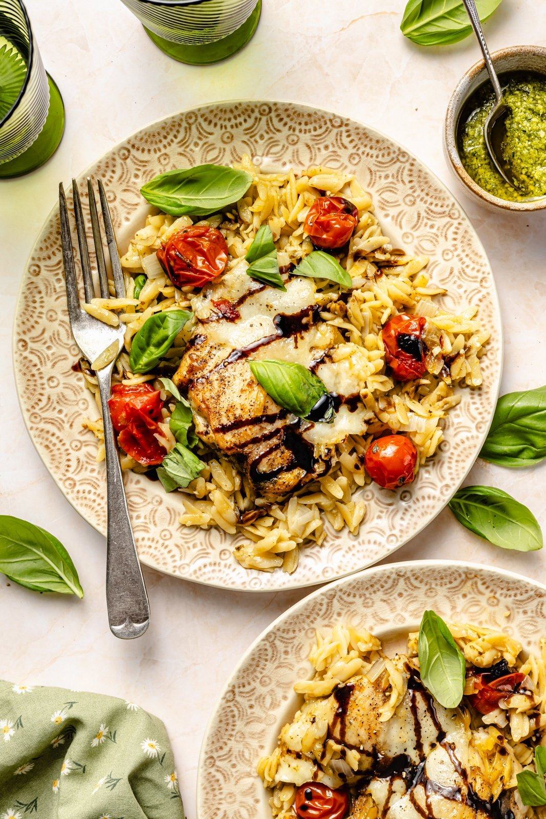 chicken caprese orzo bake on two plates