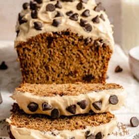 peanut butter banana bread with chocolate chips sliced on a board