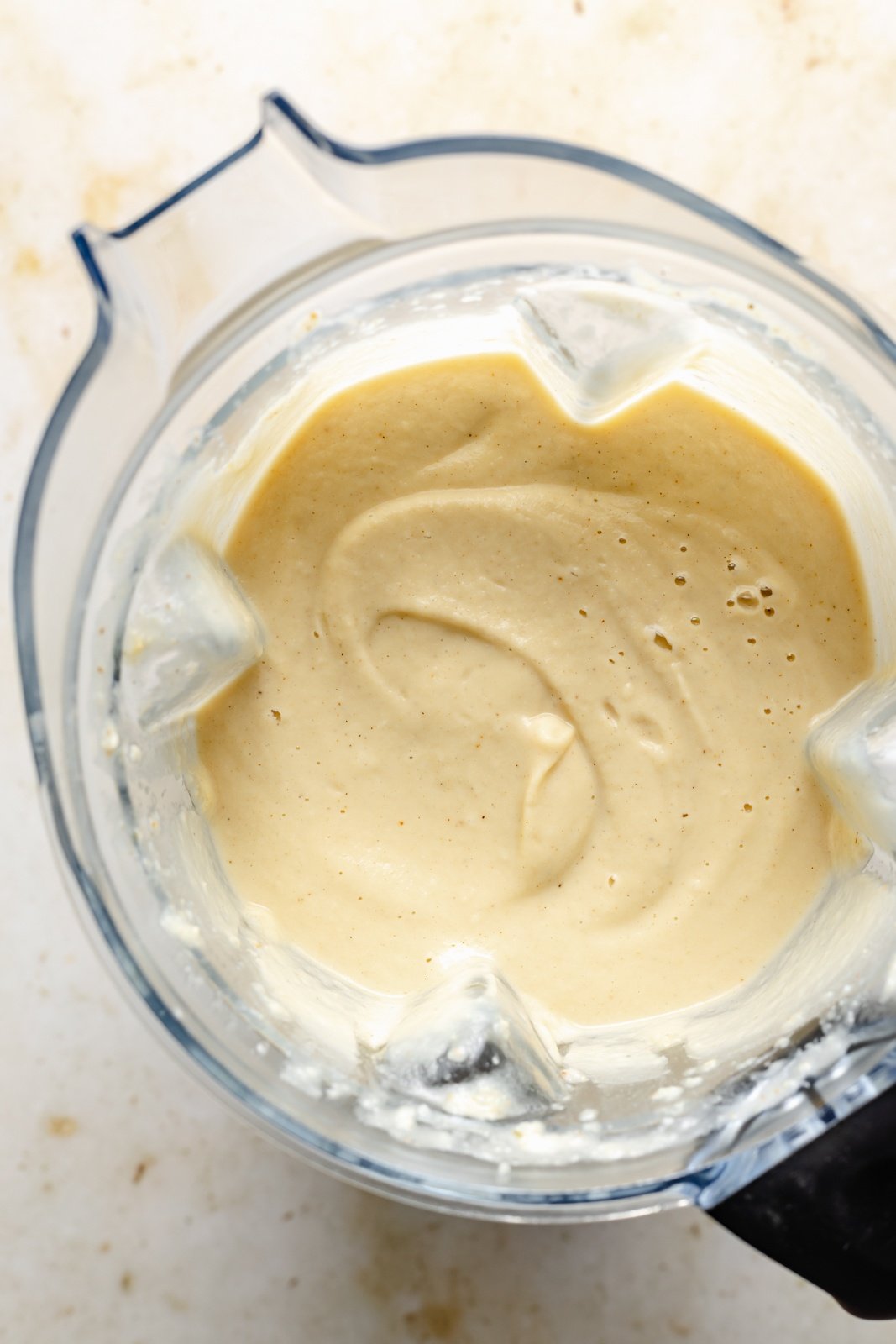 cheddar buffalo cauliflower soup blended in a blender