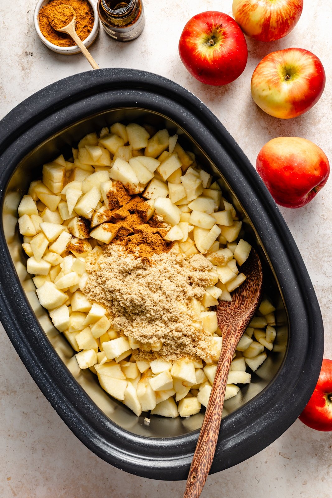ingredients for homemade applesauce in a slow cooker
