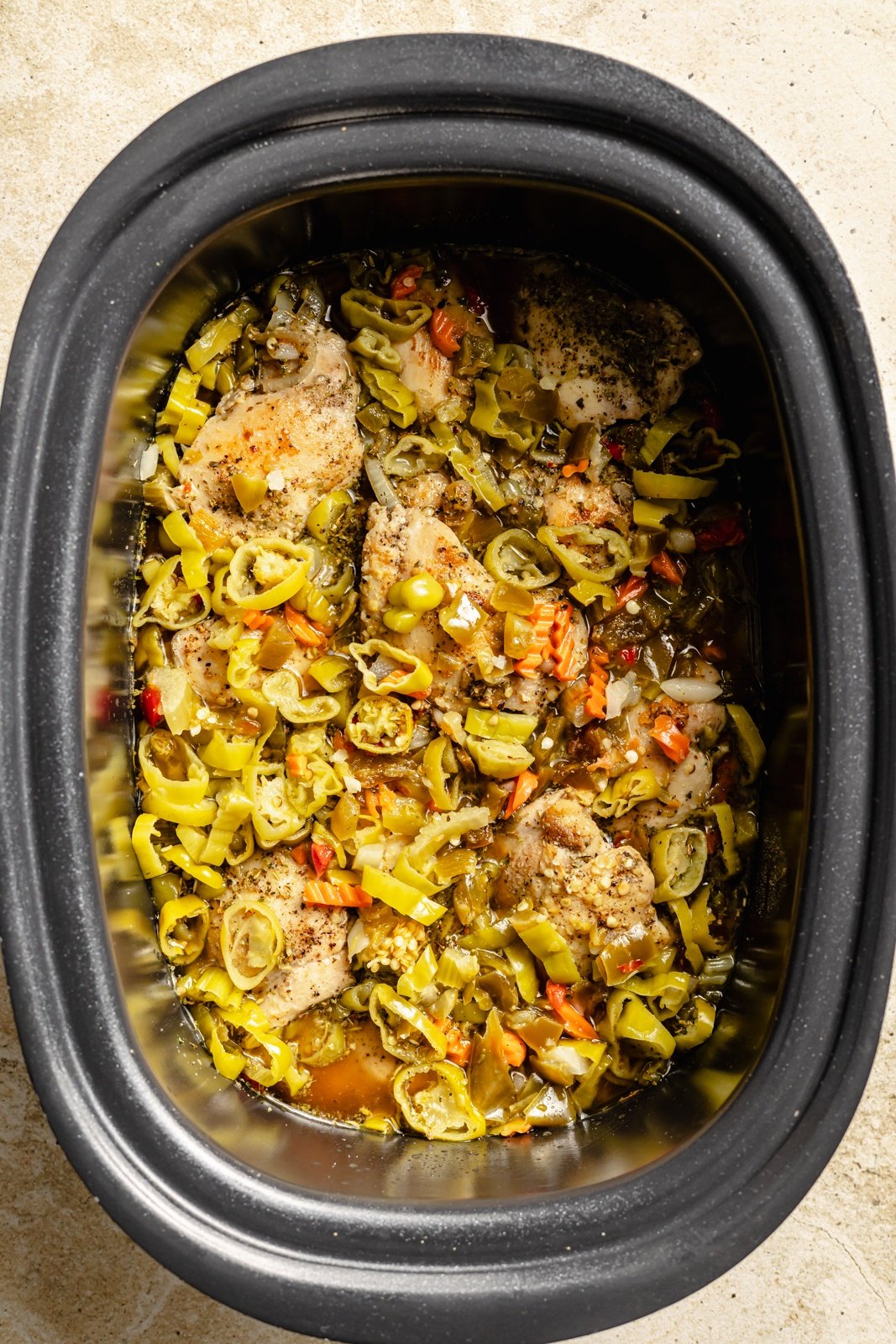 slow cooker Italian chicken sandwich ingredients in a crockpot