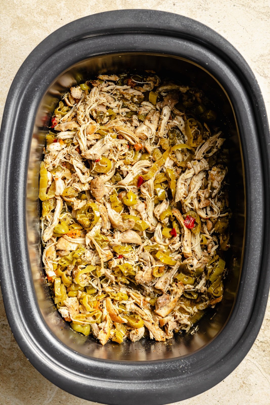 ingredients for Italian chicken sandwiches in a crockpot