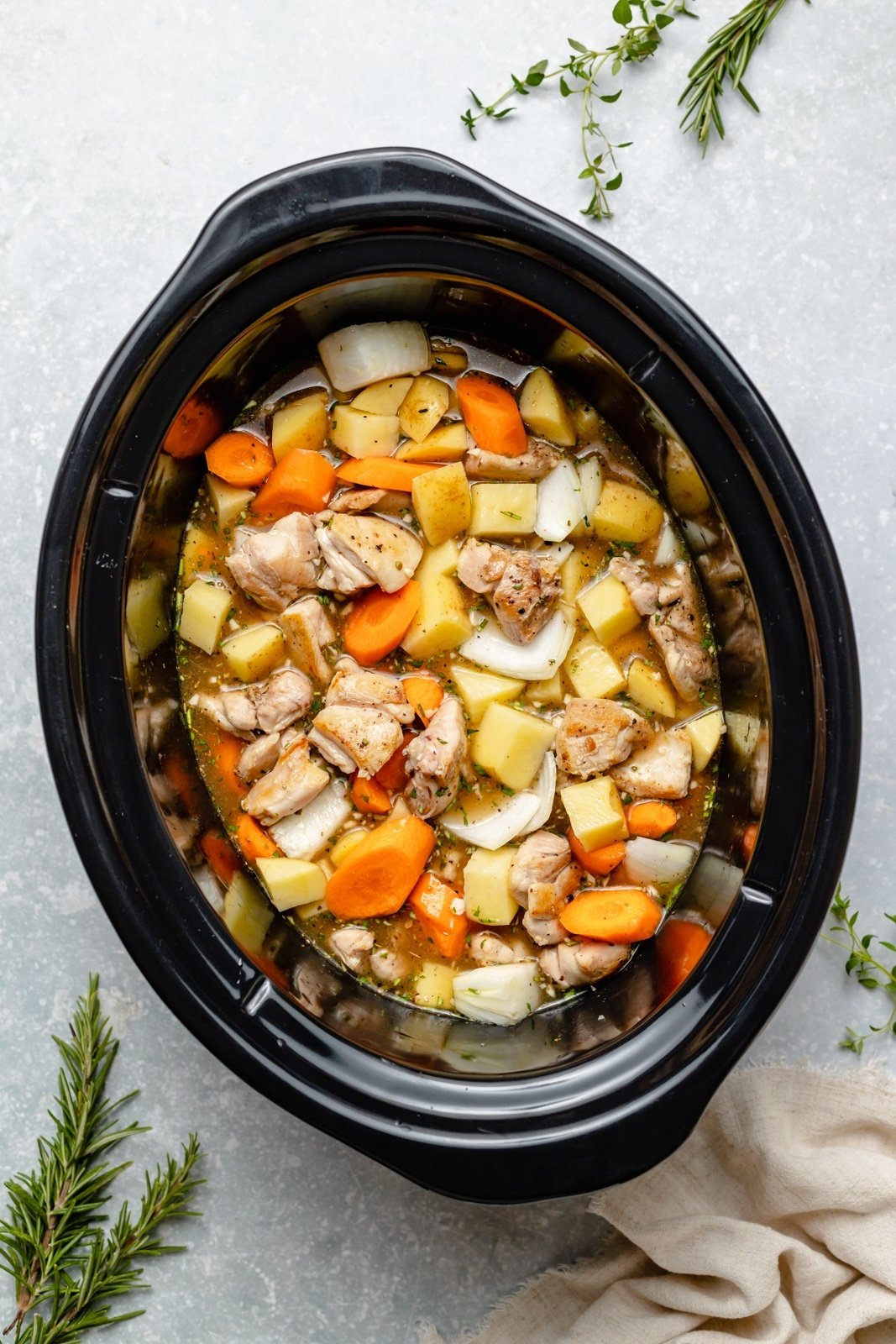 ingredients for healthy chicken stew in a slow cooker