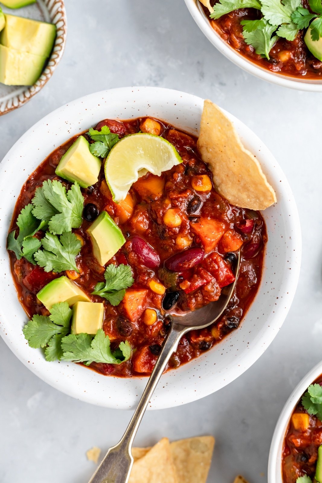 the best vegetarian chili recipe in a bowl with toppings