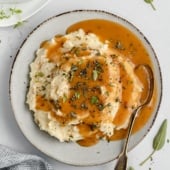 turkey gravy on a plate of mashed potatoes
